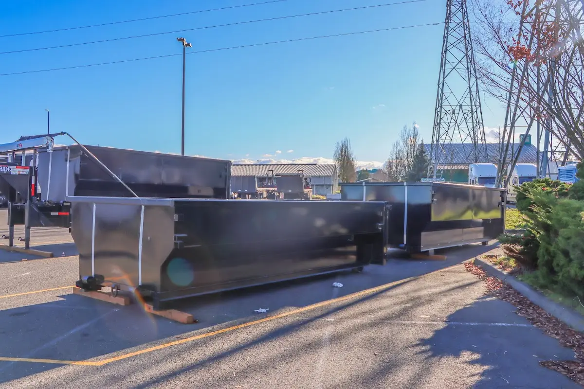 Roll-off dumpster ready for waste disposal at job site for Construction Dumpster Rental in Torrington